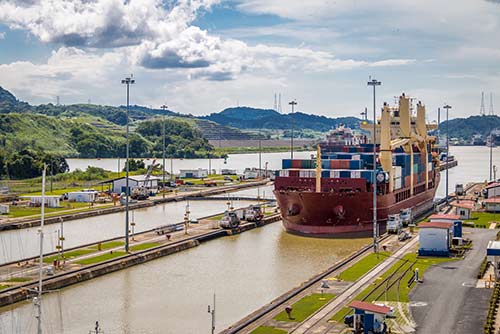 Container ship passing through locks on the Panama Canal